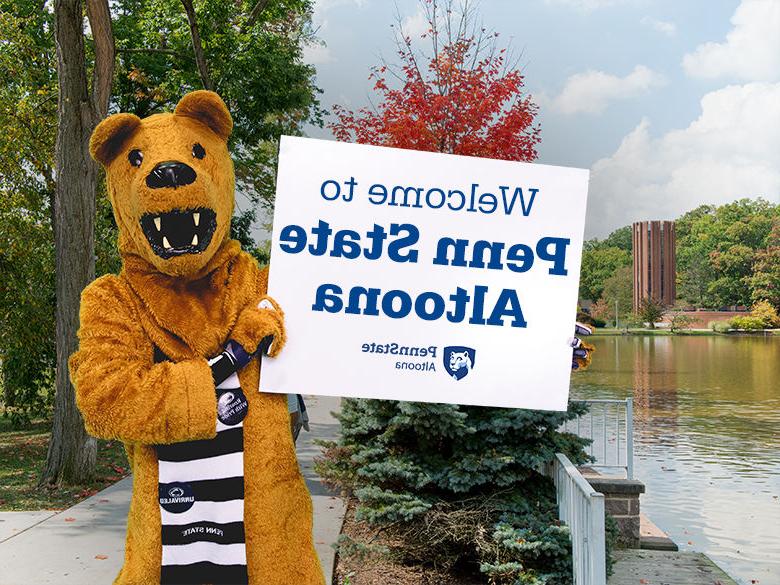 The Nittany Lion mascot holding up a sign reading Welcome to <a href='http://i189qw.xiaoneizhi.com'>十大网投平台信誉排行榜</a>阿尔图纳分校